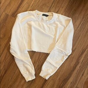 PrettyLittleThing Cream Cropped Sweatshirt
